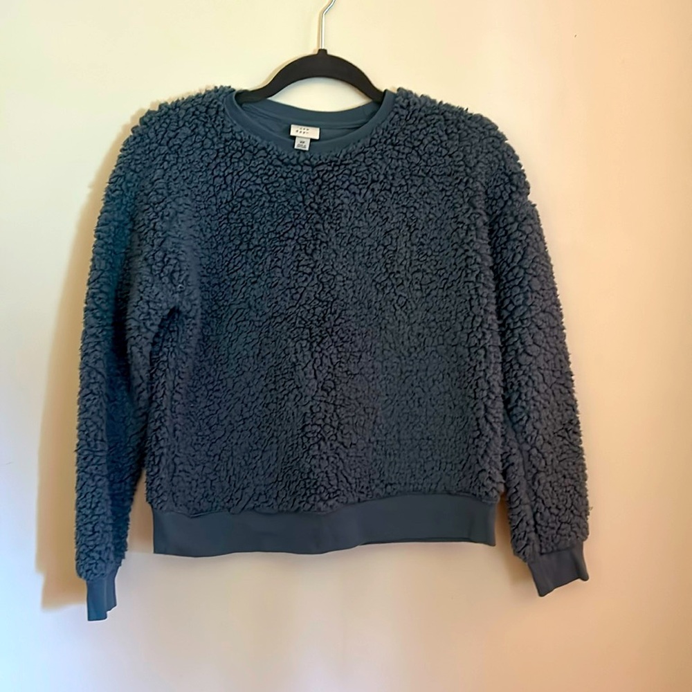 Beautiful coral blue fluffy fleece sweatshirt.  X-Small super stylish cute 😍